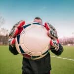 Goalkeeper Gloves Holding Ball
