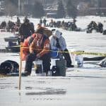 man ice fishing